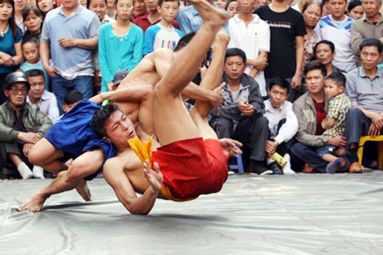 ການແຂ່ງຂັນມວຍປ້ຳຢູ່ບ້ານມາຍດົ້ງຍາມຕົ້ນລະດູບານໃໝ່